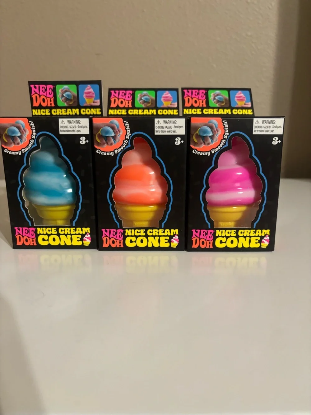 (3) NeeDoh Nice Cream Cones Squishy Toy - Blue, Orange, Pink (Set)